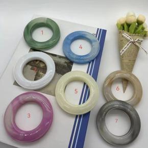 Plastic rings or other accessories for curtains